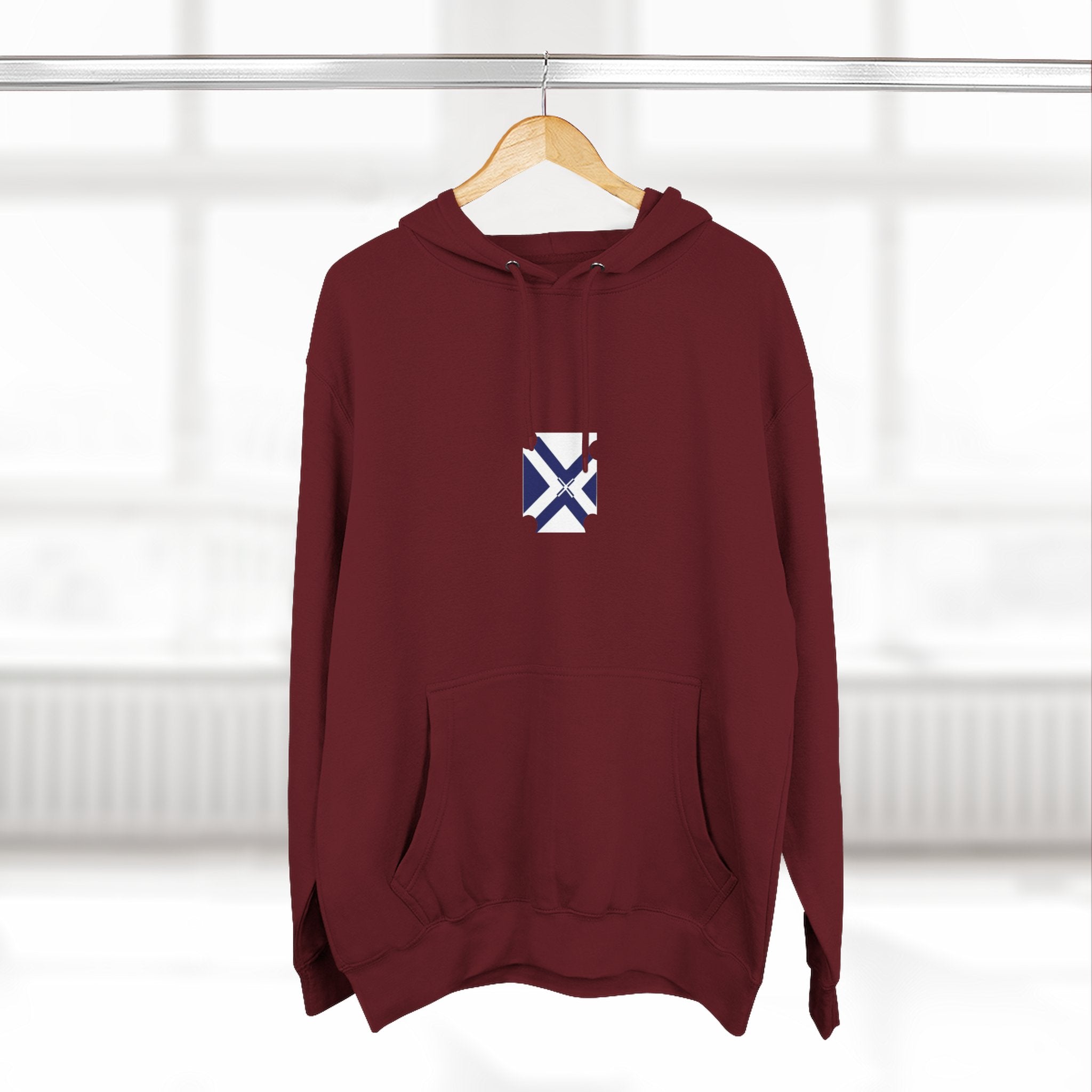 Minimalist Geometric Logo Hoodie — Small Center Chest Icon